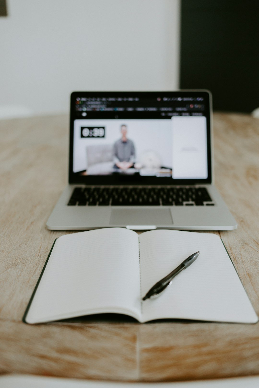 Laptop set up for recording an online coaching video presentation