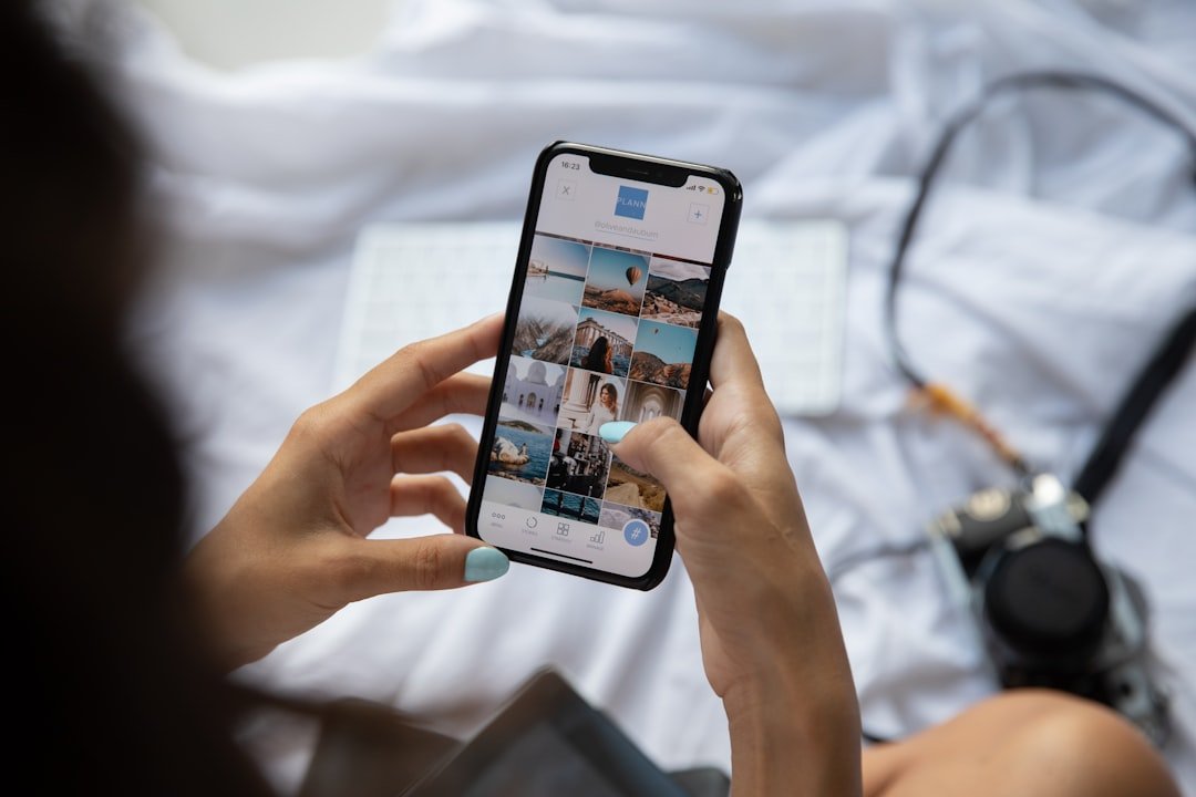 Person scrolling a social media feed on a smartphone