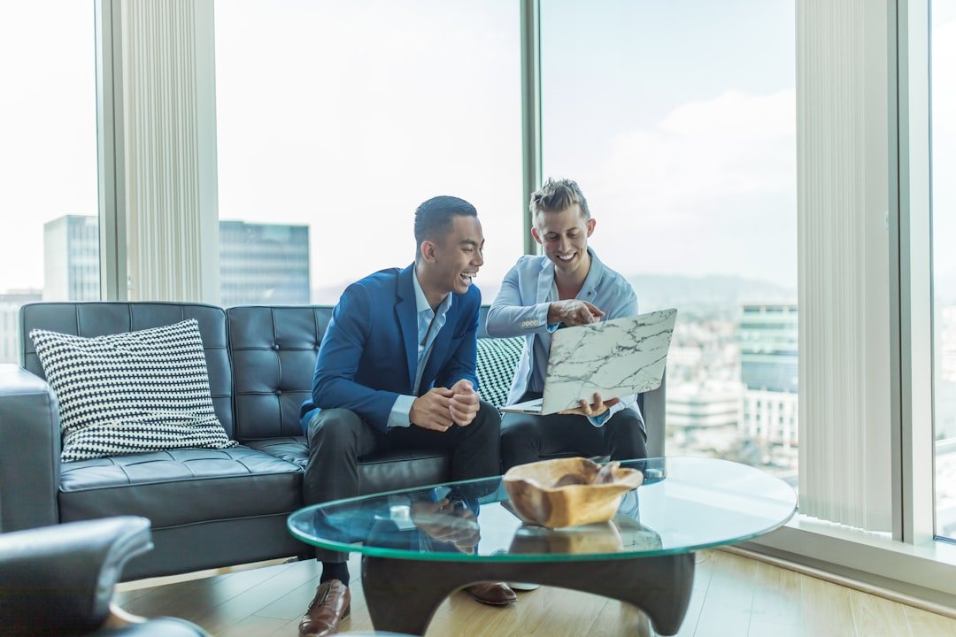 Real estate agent meeting with clients over a property discussion