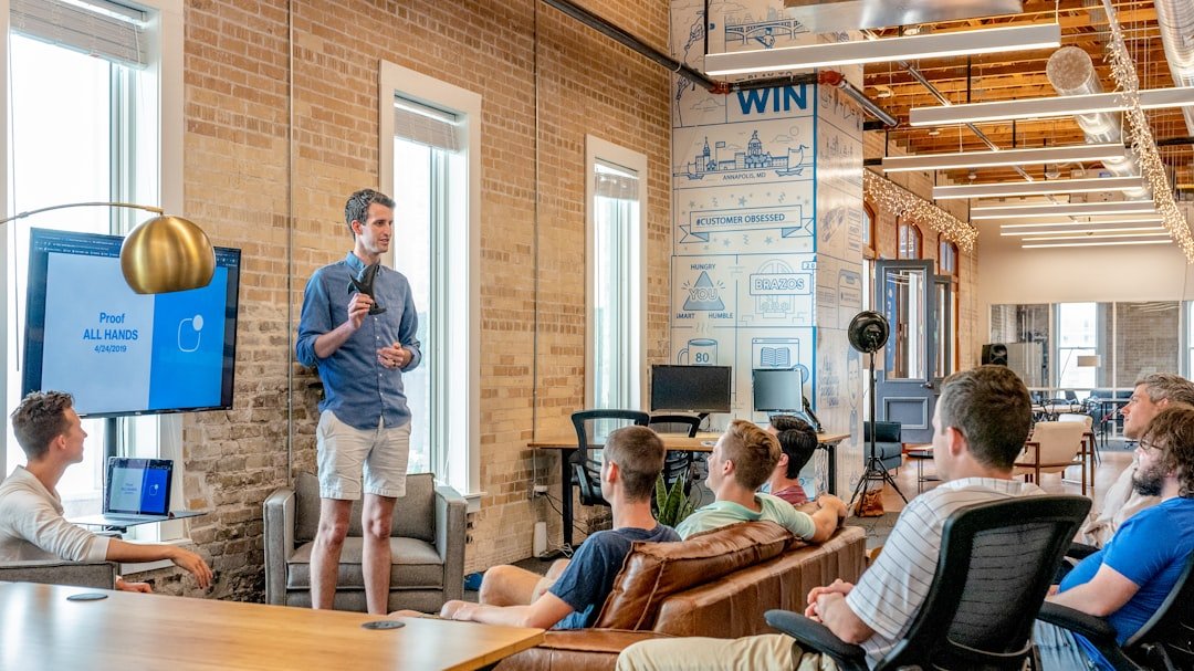 Startup founder presenting a pitch to a group during a fundraising meeting